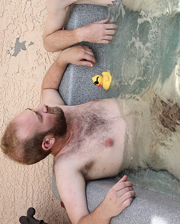 Hairy Cub Sucks Inked Ginger in a Hot Tub